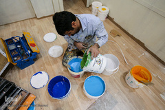 آماده سازی غرفه ایکنا در بیست و سومین نمایشگاه مطبوعات