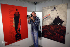 افتتاحیه نمایشگاه پوستر «سقوط شیطان بزرگ»