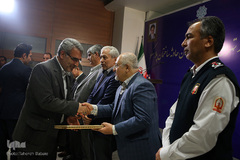 تقدیر از خانواده شهدای پلاسکو