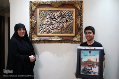 همسر و فرزند شهید مدافع حرم «تقی ارغوانی» 