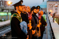 برافراشتن پرچم حرم امام حسین (ع) بر گنبد کربلای ایران