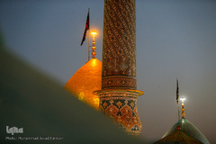 برافراشتن پرچم حرم امام حسین (ع) بر گنبد کربلای ایران