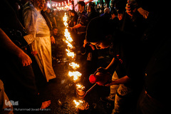 آیین مشعل گردانی عراقی ها در شب عاشورای حسینی