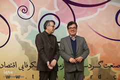 از راست محمدحسین ایمانی خوشخو، زییس پارک ملی علوم و فناوری‌های نرم و صنایع فرهنگی، سیدسعید هاشمی، رئیس دانشگاه علم و فرهنگ در آیین اختتامیه نخستین جایزه ملی تعالی گردشگری