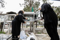 غبارروبی مزار شهدا در آخرین پنجشنبه سال ۱۳۹۷