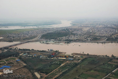 تصاویر هوایی از رودخانه کارون و منطقه سیل‌زده بامدژ