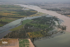 تصاویر هوایی از رودخانه کارون و منطقه سیل‌زده بامدژ