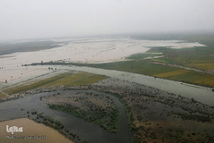 تصاویر هوایی از رودخانه کارون و منطقه سیل‌زده بامدژ