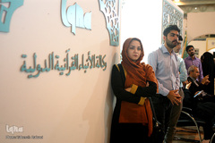 مسابقه مناظره دانشجویی میان دو تیم دانشگاه علامه طباطبایی و دانشگاه تهران در غرفه ایکنا در نمایشگاه قرآن کریم