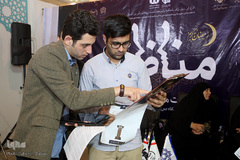 مسابقه مناظره دانشجویی میان دو تیم دانشگاه علامه طباطبایی و دانشگاه تهران در غرفه ایکنا در نمایشگاه قرآن کریم