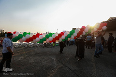 توزیع بزرگترین کیک جهان به مناسبت میلاد امام رضا(ع)