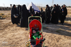 مراسم نمادین خاکسپاری شهدای کربلا در حمیدیه