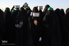 مراسم نمادین خاکسپاری شهدای کربلا در حمیدیه