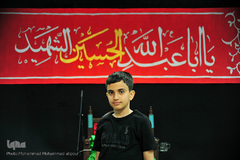 شهیار عوض‌شوشتری، 12 ساله، دانش آموز. از 8 سالگی روضه می‌رفته است. می‌گویم: امام حسین(ع). می‌گوید: مظهر خوبی.