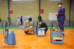 ضد عفونی معابر قم توسط نیرو های حشد الشعبی