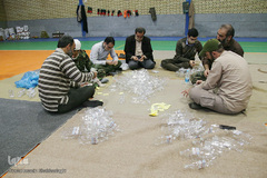 ضد عفونی معابر قم توسط نیرو های حشد الشعبی