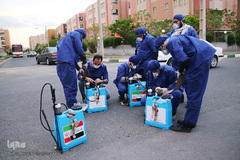 ضد عفونی معابر قم توسط نیرو های حشد الشعبی