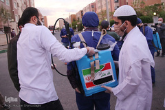 ضد عفونی معابر قم توسط نیرو های حشد الشعبی