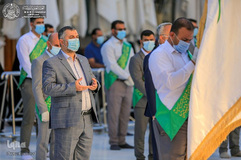 تعویض پرچم حرم حضرت علی(ع)