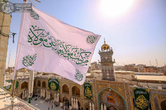 تعویض پرچم حرم حضرت علی(ع)