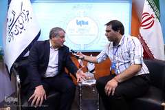 حضور محسن هاشمی، رییس شورای اسلامی شهر تهران در غرفه ایکنا در بيست و سومين نمايشگاه مطبوعات