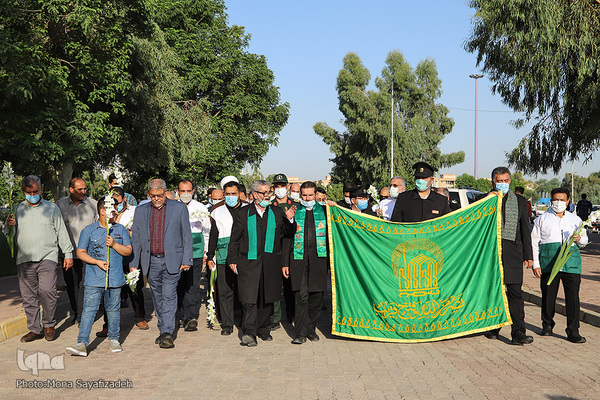 ادای احترام خدام رضوی به مقام والای شهدای گمنام اهواز