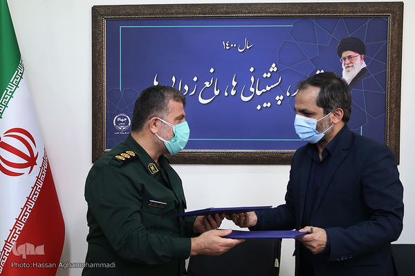 مراسم امضای تفاهم نامه همکاری های مشترک میان جهاد دانشگاهی و بنیاد حفظ آثار و ارزشهای دفاع مقدس