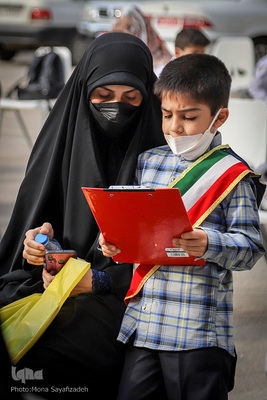 مرسم نواختن زنگ قرآن دانش آموزان پایه اول  خوزستانی در دبستان آیت‌الله بهبهانی اهواز