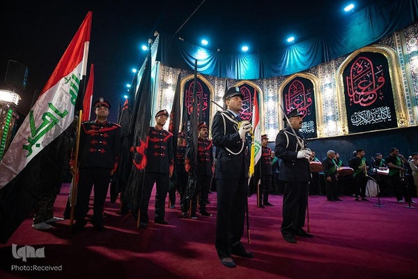 تعویض پرچم حرمین شریفین در کربلا به مناسبت فرارسیدن ماه محرم