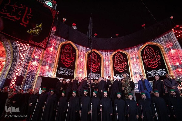 تعویض پرچم حرمین شریفین در کربلا به مناسبت فرارسیدن ماه محرم