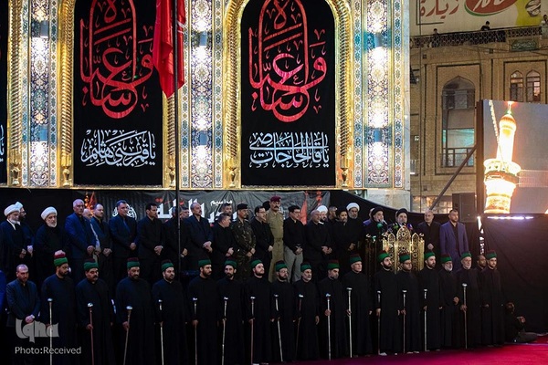 تعویض پرچم حرمین شریفین در کربلا به مناسبت فرارسیدن ماه محرم