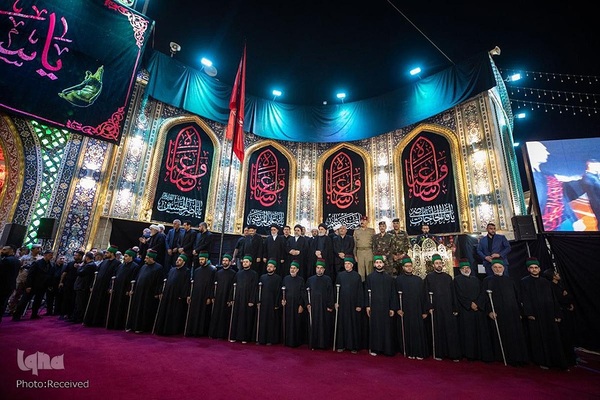 تعویض پرچم حرمین شریفین در کربلا به مناسبت فرارسیدن ماه محرم