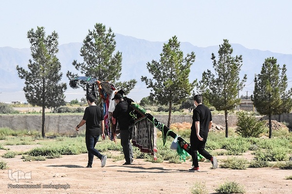 حسینیه ایران؛ آیین سنتی سنگ زنی و نخل گردانی در روستای علاء سمنان