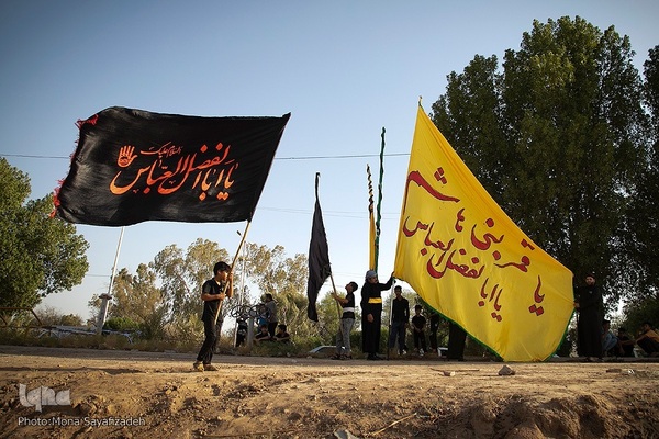 آیین نمادین خاکسپاری پیکرهای شهدای کربلا در حمیدیه