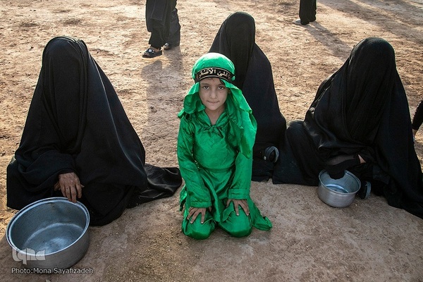 آیین نمادین خاکسپاری پیکرهای شهدای کربلا در حمیدیه