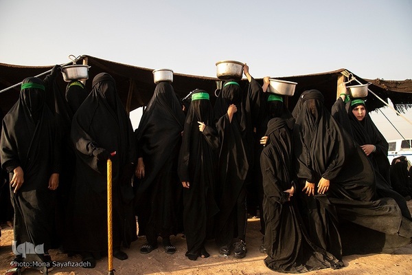 آیین نمادین خاکسپاری پیکرهای شهدای کربلا در حمیدیه