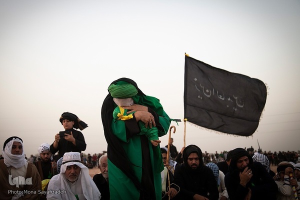 آیین نمادین خاکسپاری پیکرهای شهدای کربلا در حمیدیه