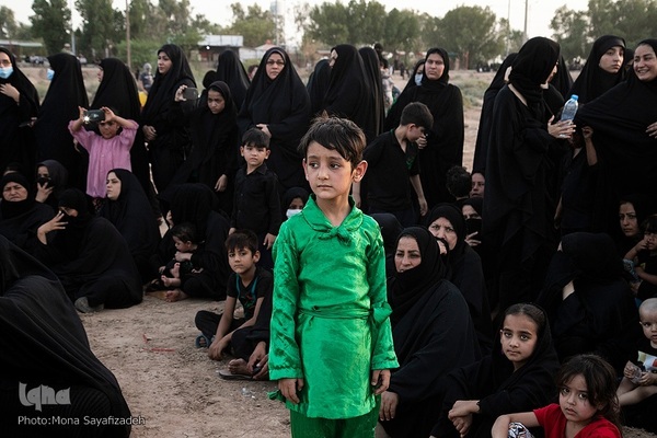 آیین نمادین خاکسپاری پیکرهای شهدای کربلا در حمیدیه