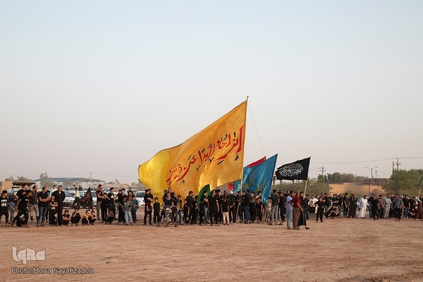 آیین نمادین خاکسپاری پیکرهای شهدای کربلا در حمیدیه