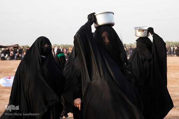 آیین نمادین خاکسپاری پیکرهای شهدای کربلا در حمیدیه