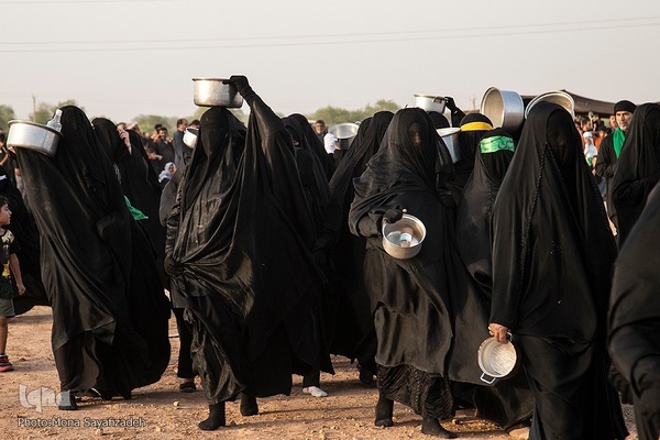 آیین نمادین خاکسپاری پیکرهای شهدای کربلا در حمیدیه