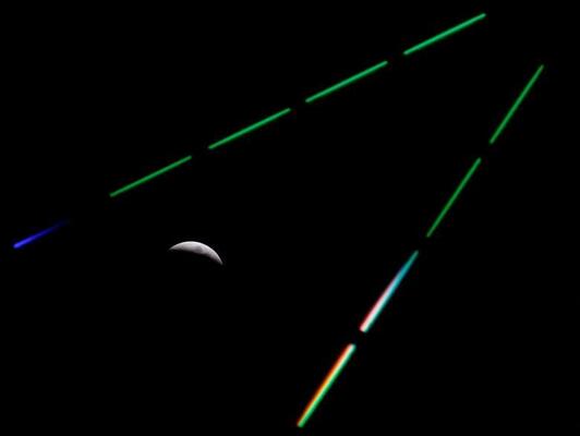 نمایی از ماه‌گرفتگی از میان چرخ و فلکی در پارک توکیو ژاپن