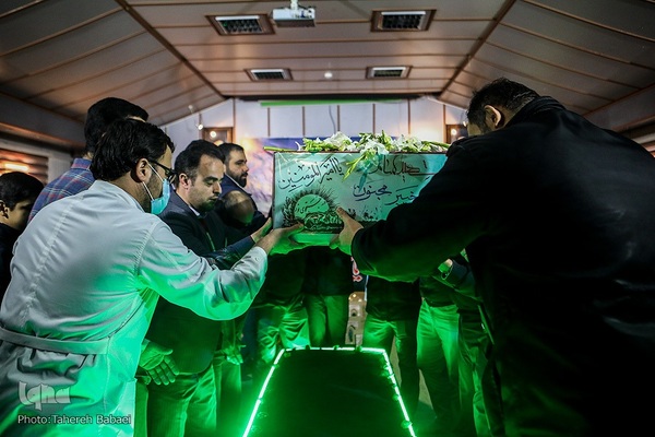 آیین وداع با پیکر شهید دفاع مقدس در بیمارستان نجمیه