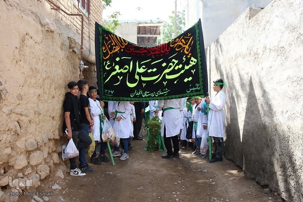 مراسم چغچغه‌زنی روز تاسوعای حسینی در روستای انجدان