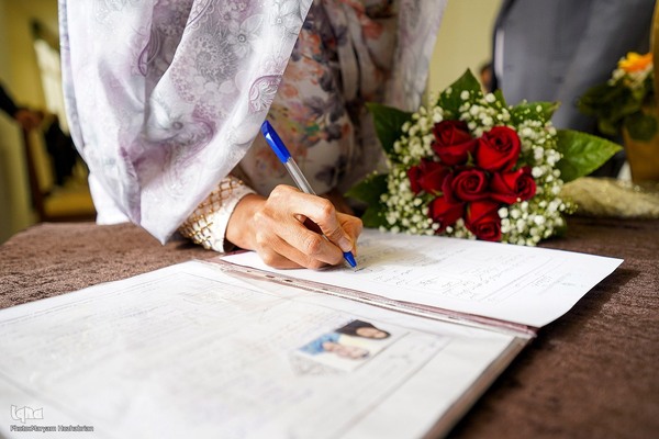 مراسم عقد زوجین در جوار حرم حضرت شاهچراغ(ع)