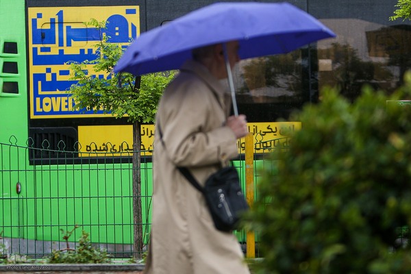 ترنم باران بهاری بر چهره شهر