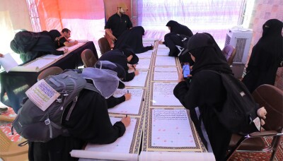 Rédaction du Coran par les pèlerins de l'imam Hussein (as)