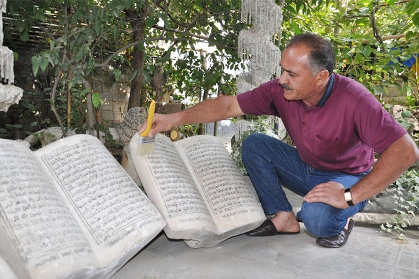 Kur'an-ı Kerim'i taşa işleyen usta yetkililere seslendi