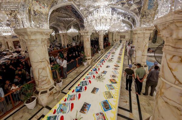 İmam Ali (a.s) türbesinde dünyanın en büyük pastası dağıtıldı