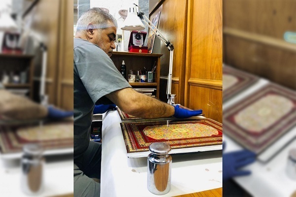 Eski bir Kur'an cildinin Hz. Abbas'ın haremi tarafından restorasyonu